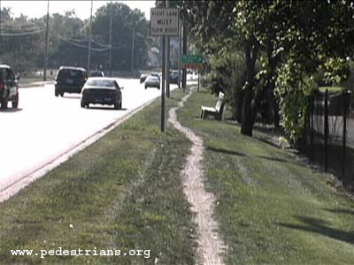 Photo - Dirt path instead of a sidewalk.